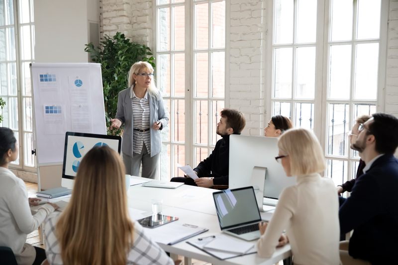 woman teaching a small group